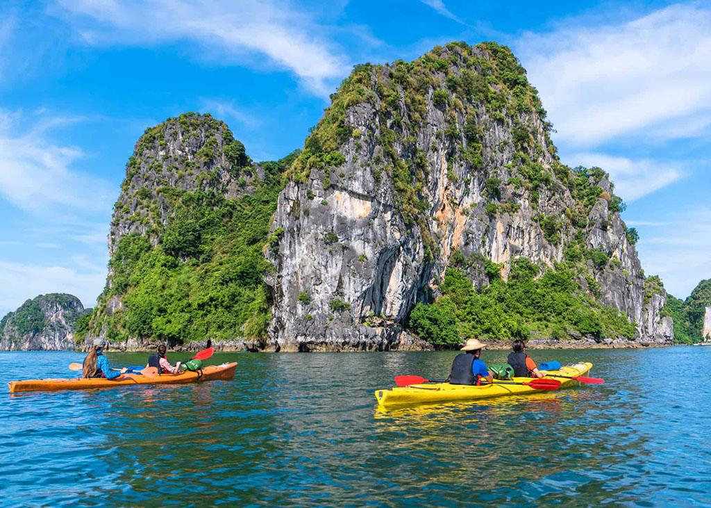 Kayaking in Ha Long Bay in summer